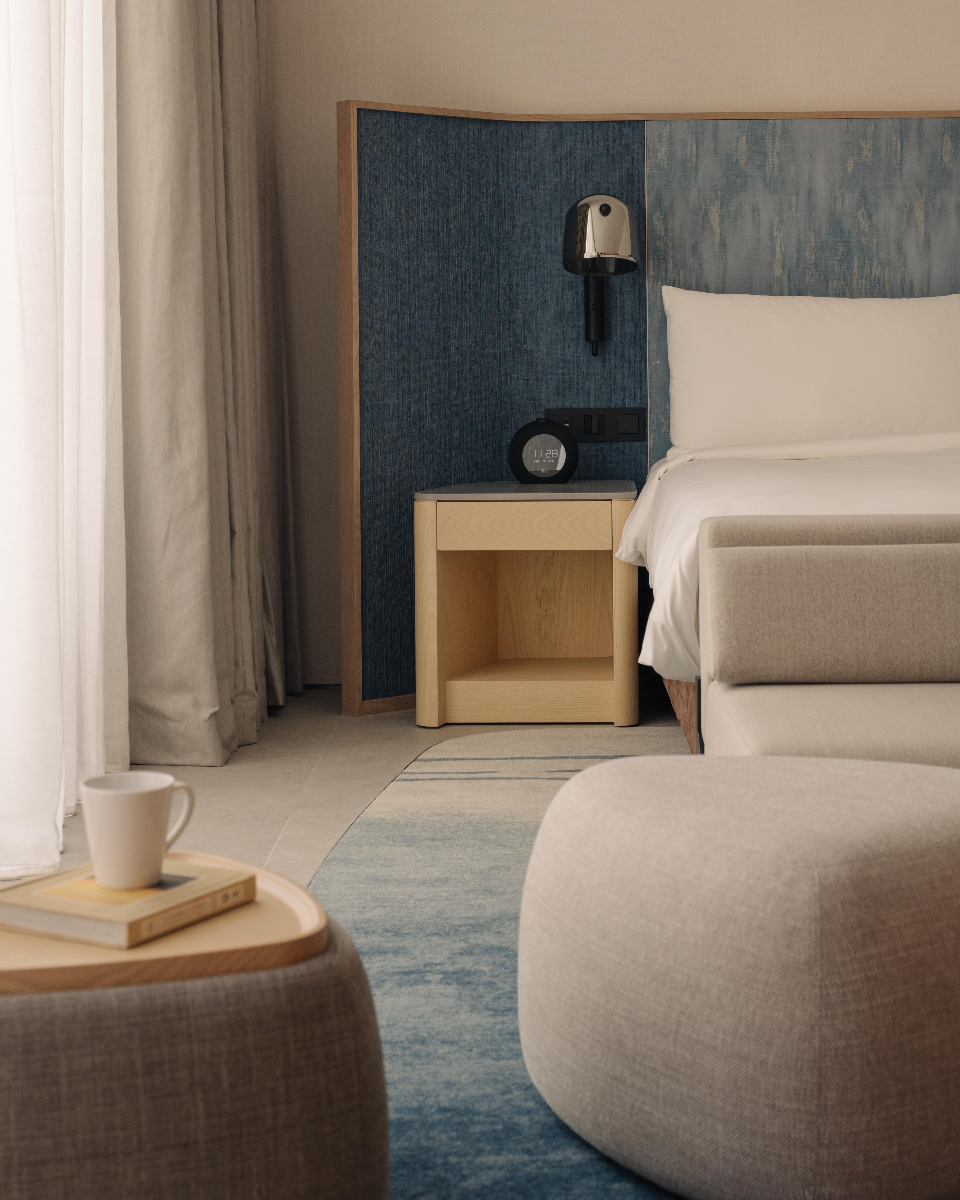 Coastal hues and bold accents breathe modern elegance into the space